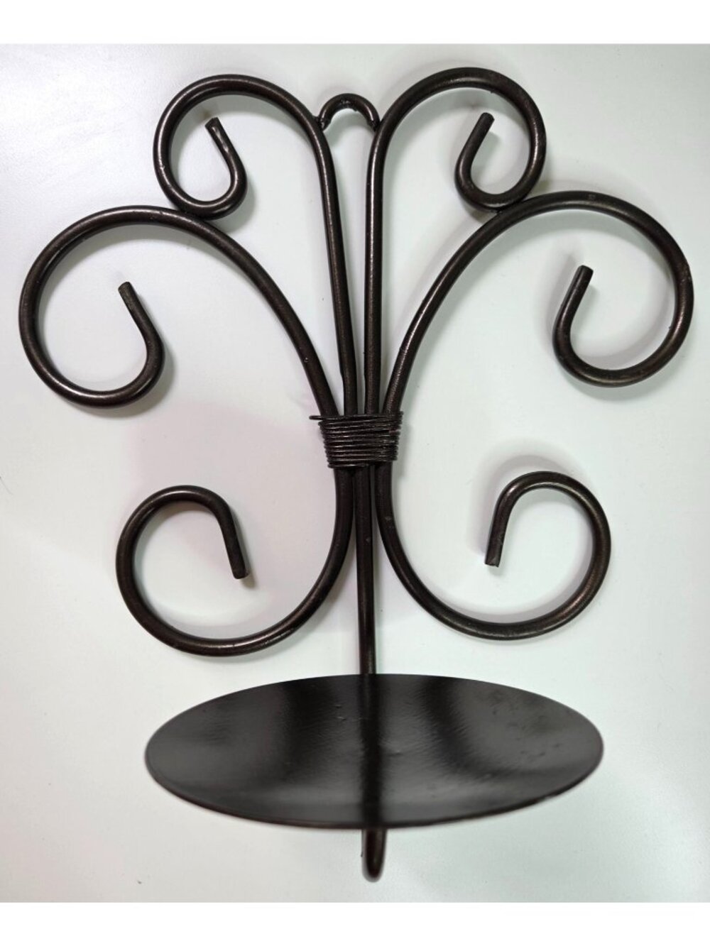 Scrolled Metal Wall-Mounted Candle Holder With Round Plate Antique Black Finish